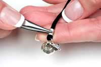 Crimping tube onto lacing